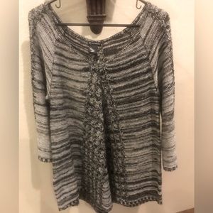 Sweater gently worn. 3/4 length sleeves.